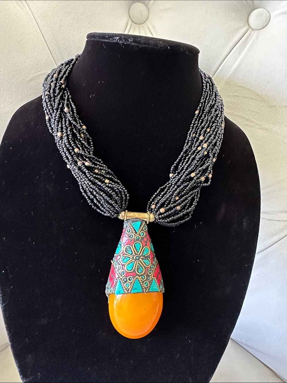 Handcrafted Black Beaded Necklace with Orange Teardrop Pendant